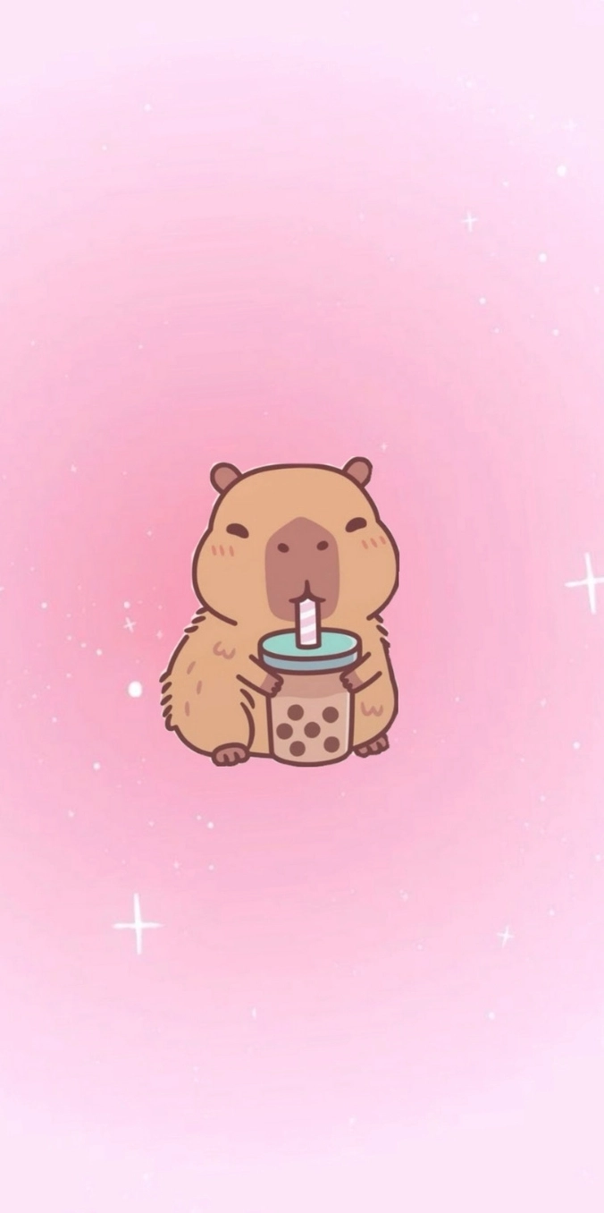 Hình nền capybara màu hồng đang ngồi trên một quả cam